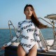 Women's clerical script open back bikini wetsuit 2mm with limestone neoprene for freediving, mermaid style, and kite surfing