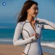 Silver Nova Series front-zip longsleeve bikini wetsuit 2mm in glitter silver from Trudive for freediving, snorkeling, and paddleboarding